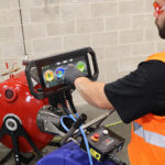 sewer ninja professional performing a video inspection to determine issues within a customer's drain