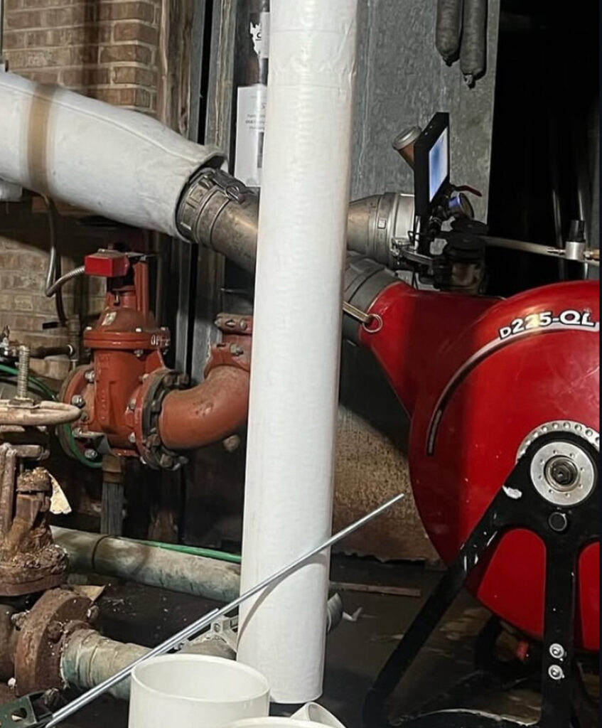 Pipes for a residential sewer drain service with equipment hooked up for video inspection